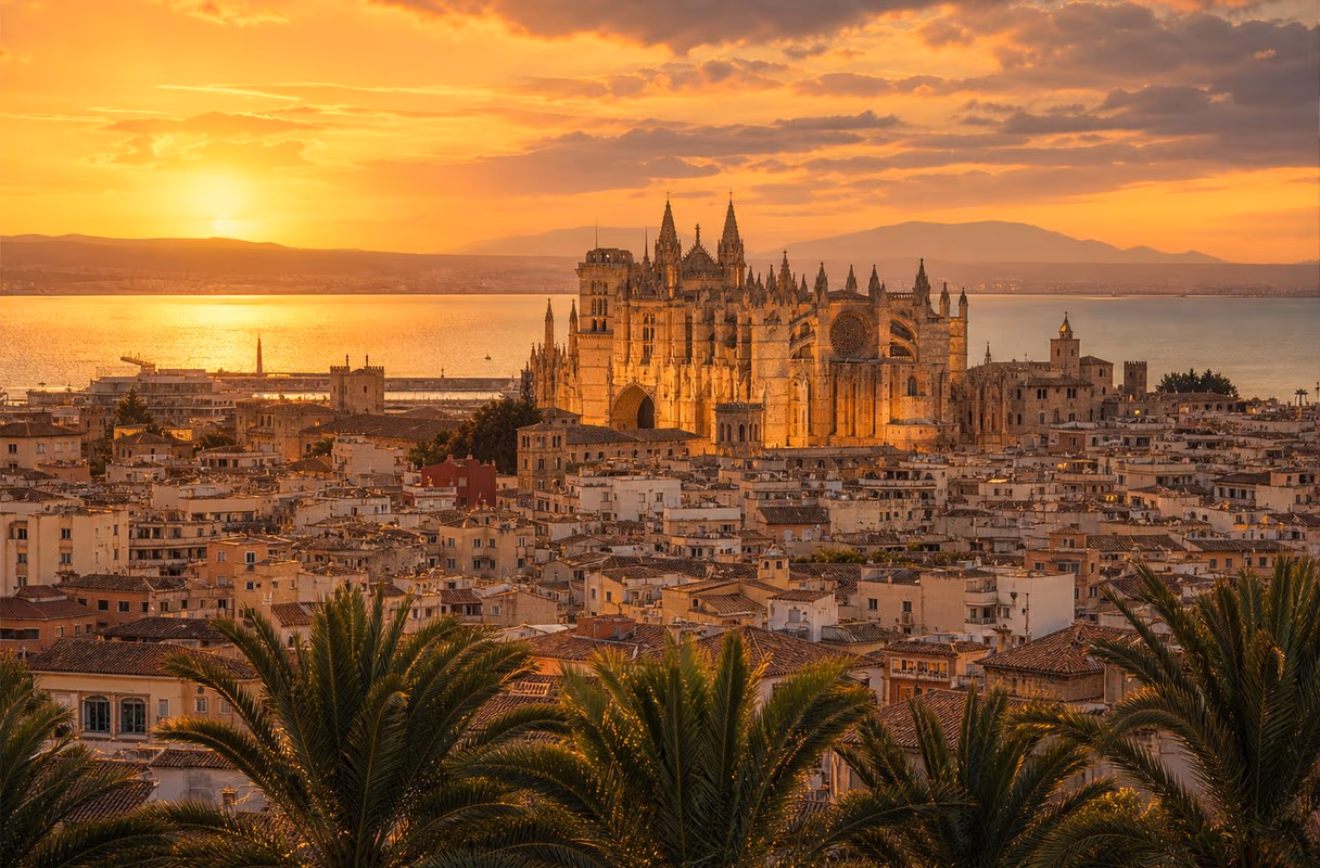 View over Palma's cathedral and the bay at sunset